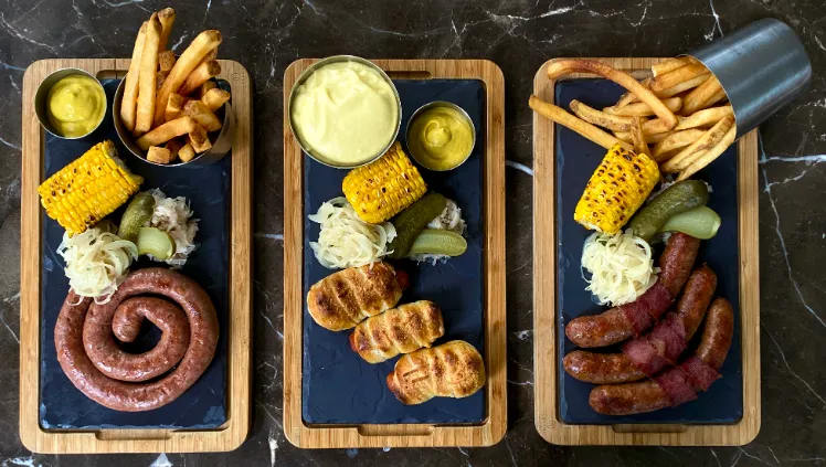 Sausage platter at SANTAI Pool Bar, part of Sip & Sizzles dining experience in Kuala Lumpur, Oct 16 – Nov 30, 2024.